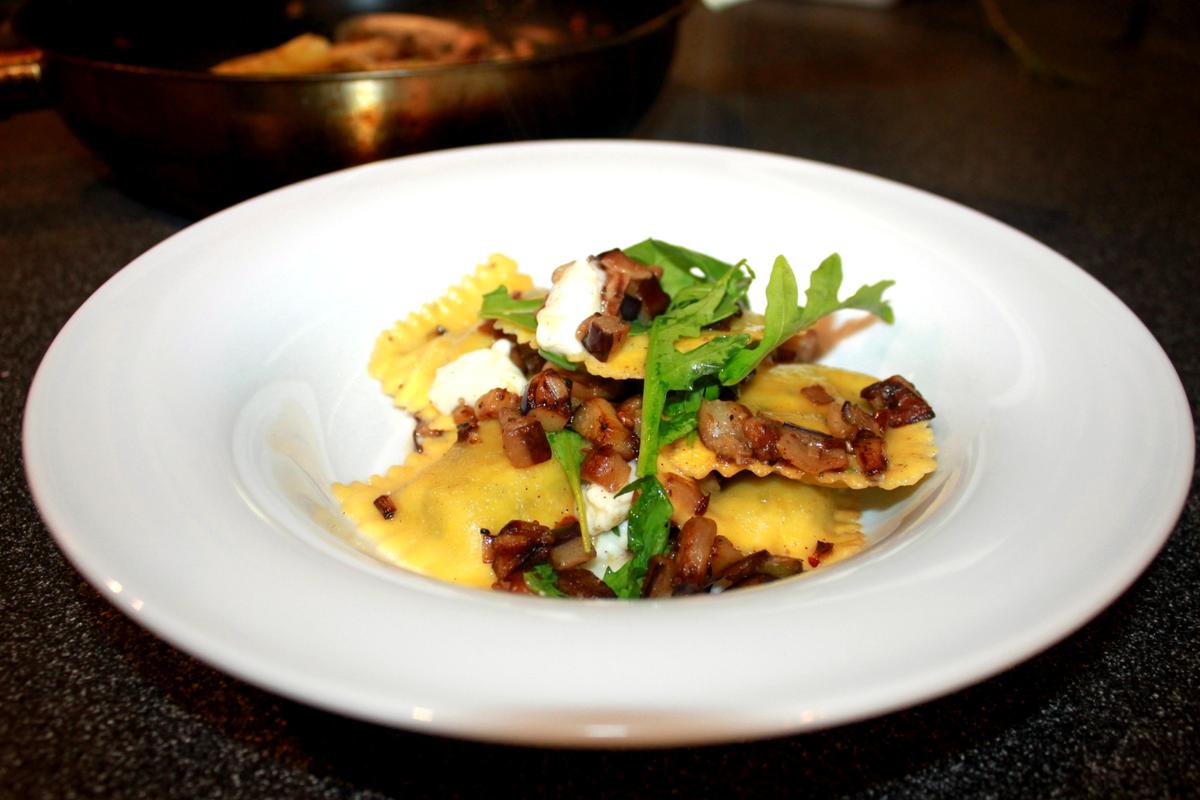 Rezeptbild: Ravioli con Melanzana e Rucola