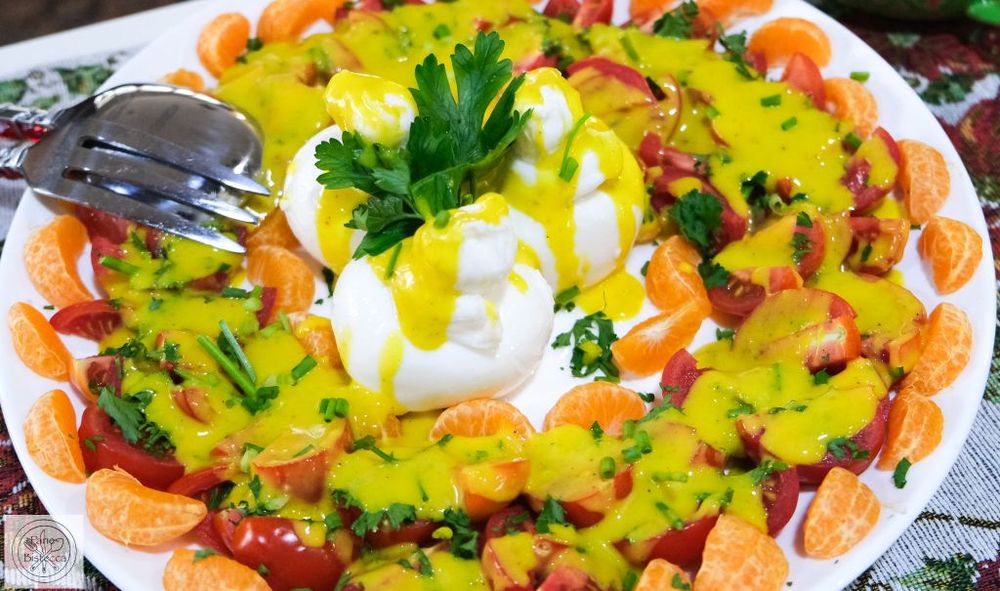 Rezeptbild: Tomaten-Mandarinen Salat mit Mango Dressing und Burratina