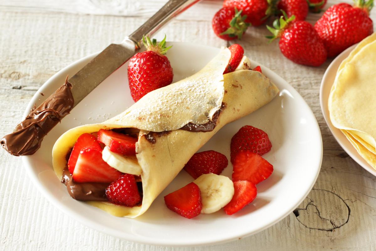 Rezeptbild: Palatschinken mit Nutella, Erdbeeren und Bananen