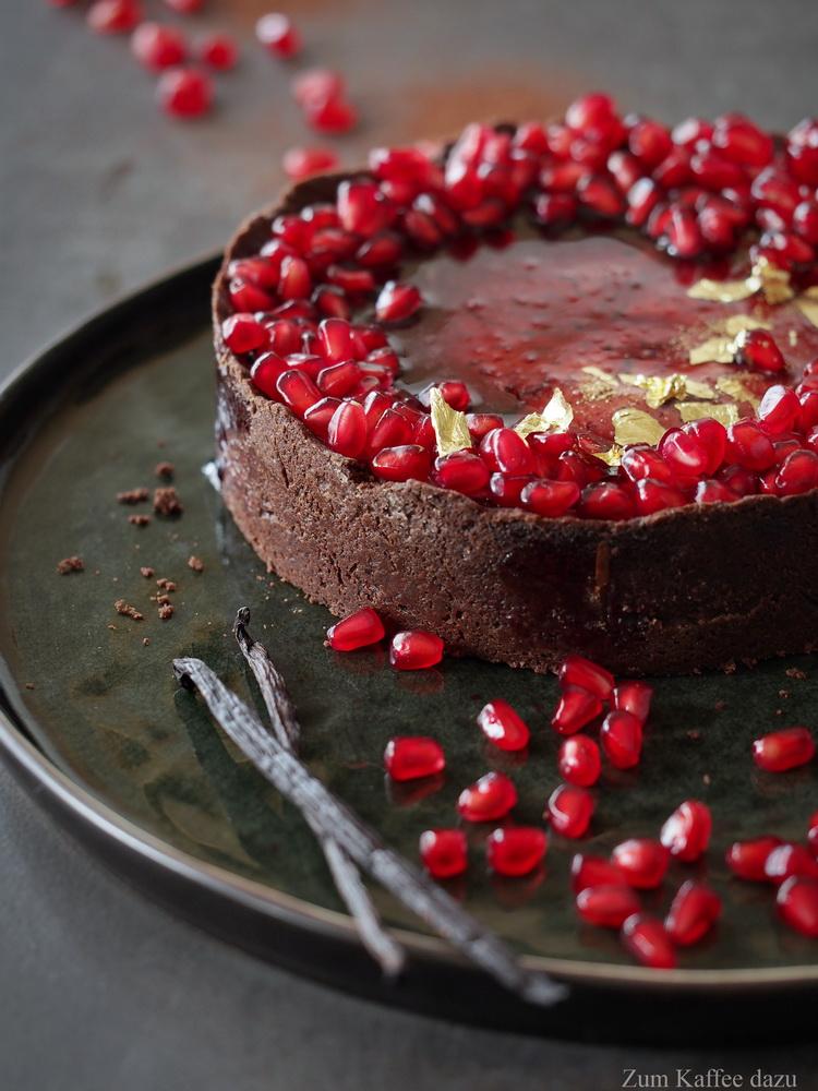 Rezeptbild: Vanille-Cheesecake mit Rotwein und Granatapfel