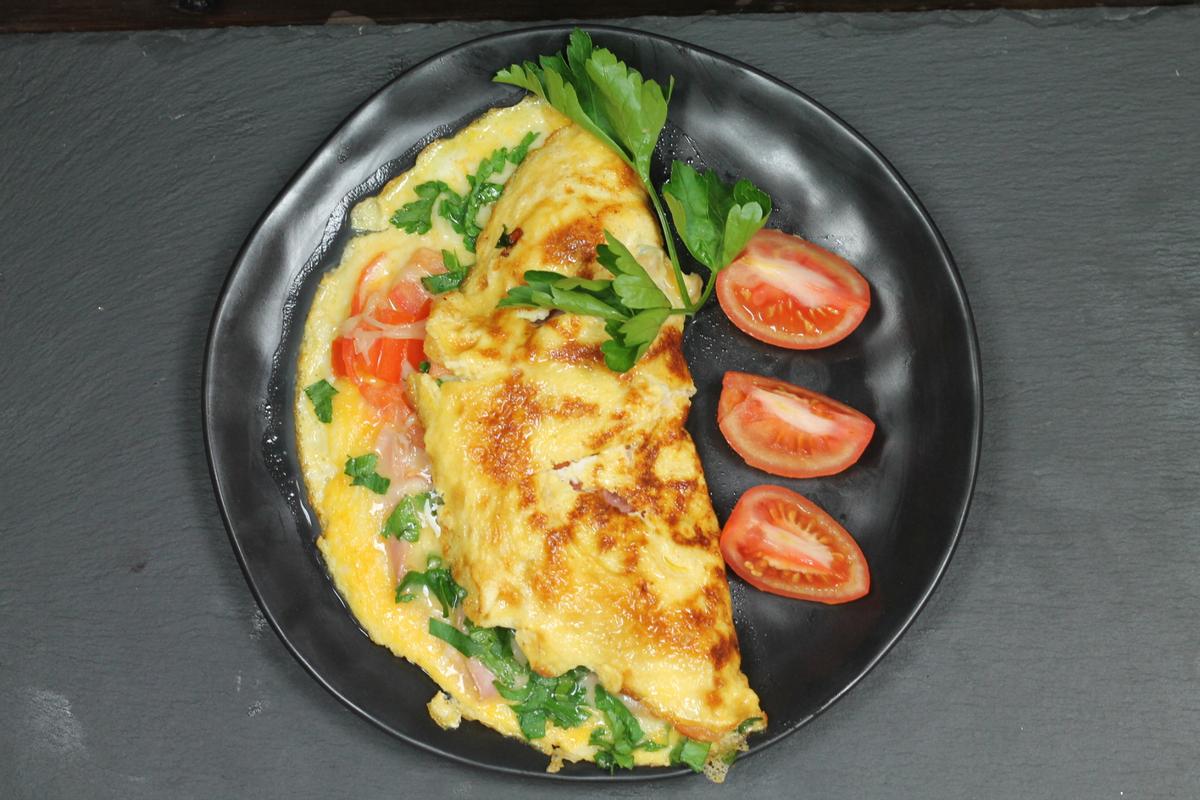 Rezeptbild: Omelette mit Schinken, Käse und Tomaten