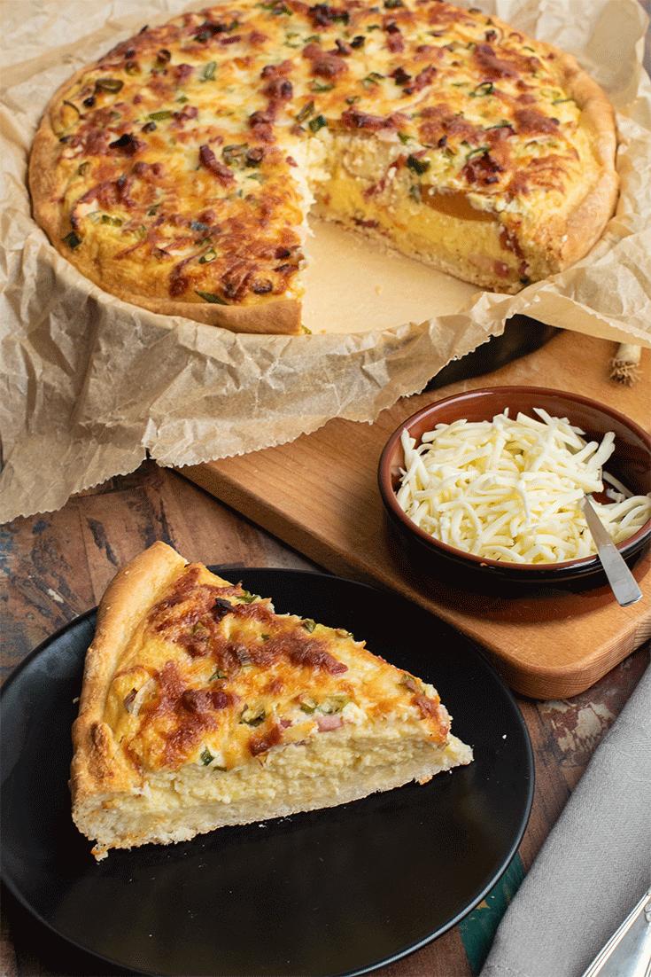 Rezeptbild: Kartoffel-Quiche mit Apfel, Speck und Frühlingszwiebeln